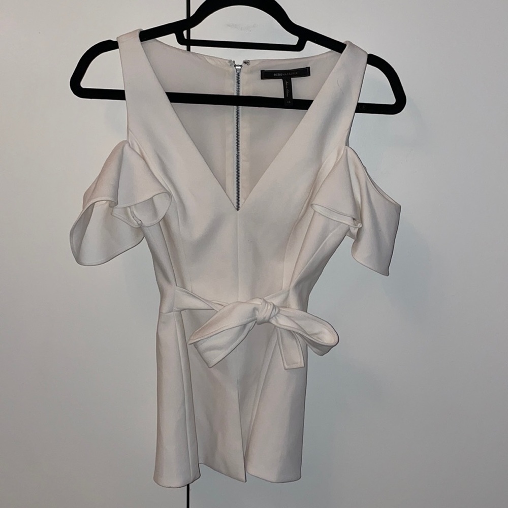 BCBG elegant, white off the shoulder women’s blouse.
